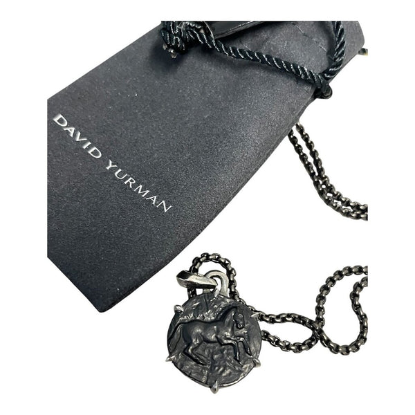 horse pendant on black chain